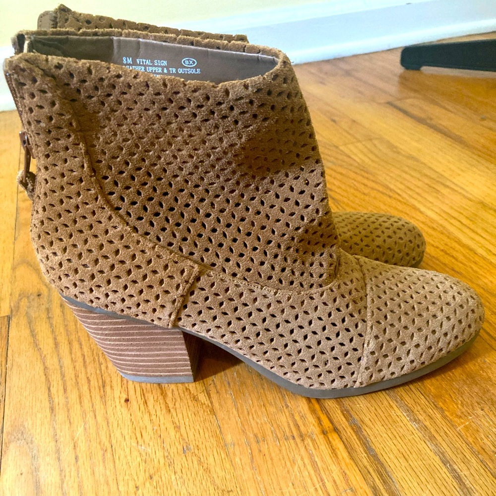 Aerosoles booties with cutouts.